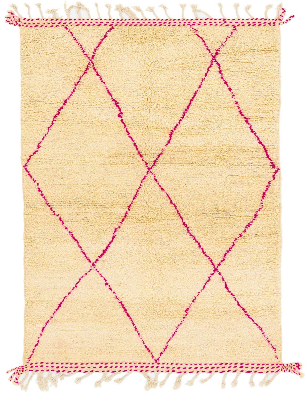 A 5x8 rectangular ivory shag rug with a bold fuchsia tribal diamond pattern and fringed ends, suitable for a living room.