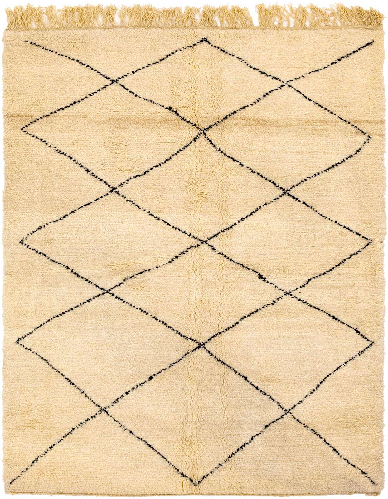 A 5x8 rectangular ivory shag rug with a black tribal diamond pattern and fringed ends, perfect for a living room.