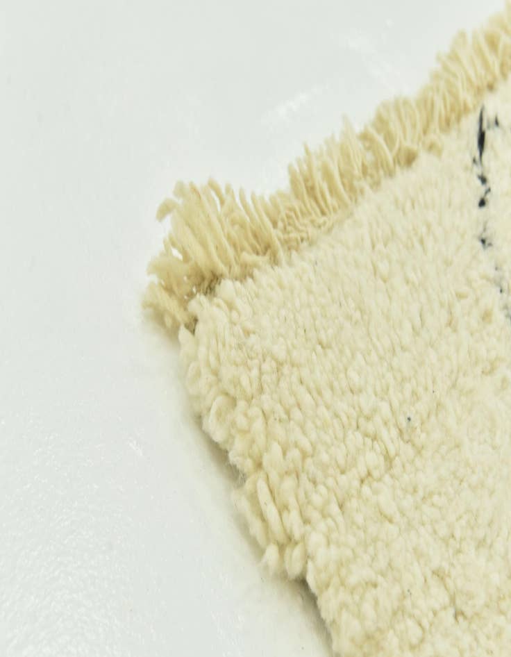 Detail image of  4' 10 x 7' 9  Hand Knotted Moroccan Wool Rug