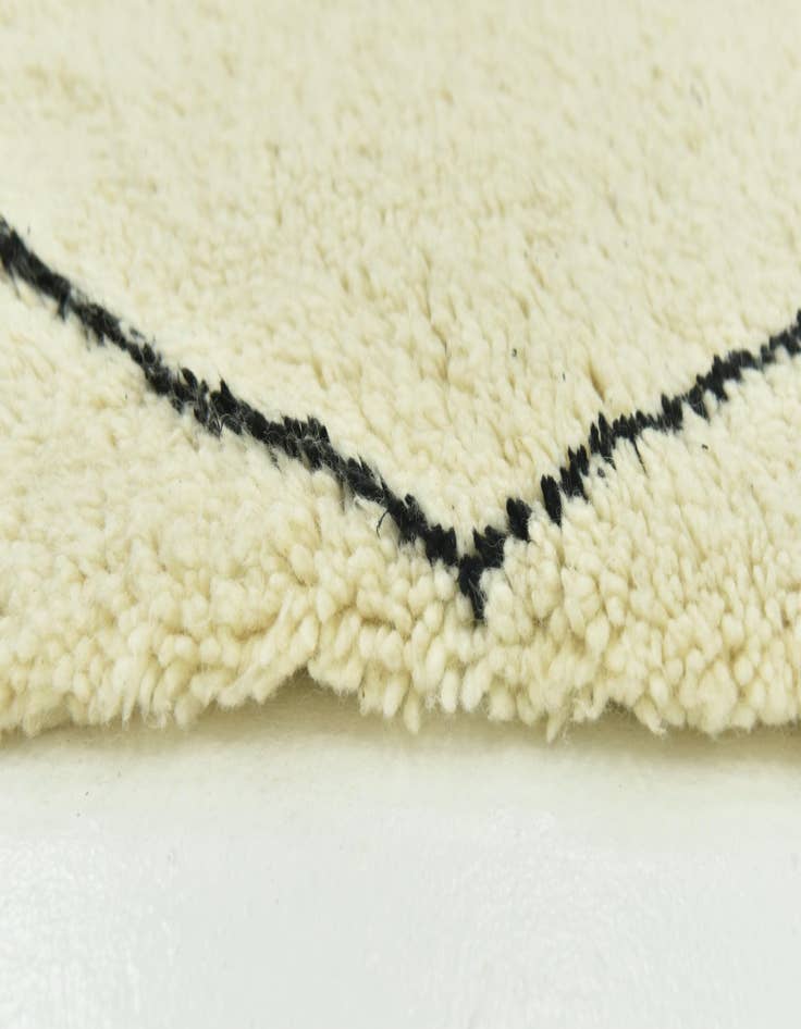 Detail image of  4' 10 x 8'  Hand Knotted Moroccan Wool Rug