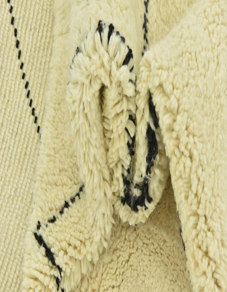 Detail image of  6' 6 x 9' 10  Hand Knotted Moroccan Wool Rug