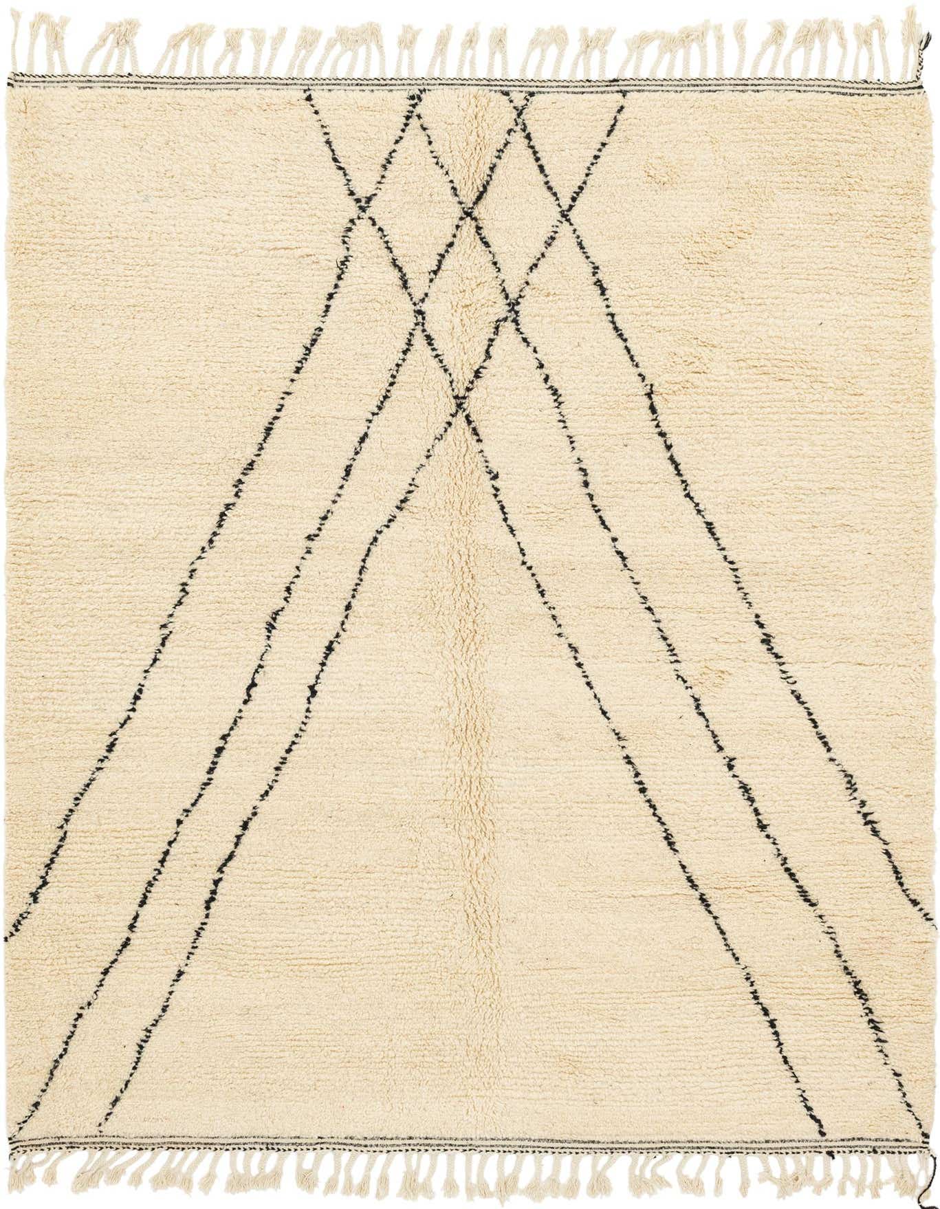 A 7x10 rectangular ivory shag rug with a bold black tribal geometric pattern and fringe, perfect for a modern living room.