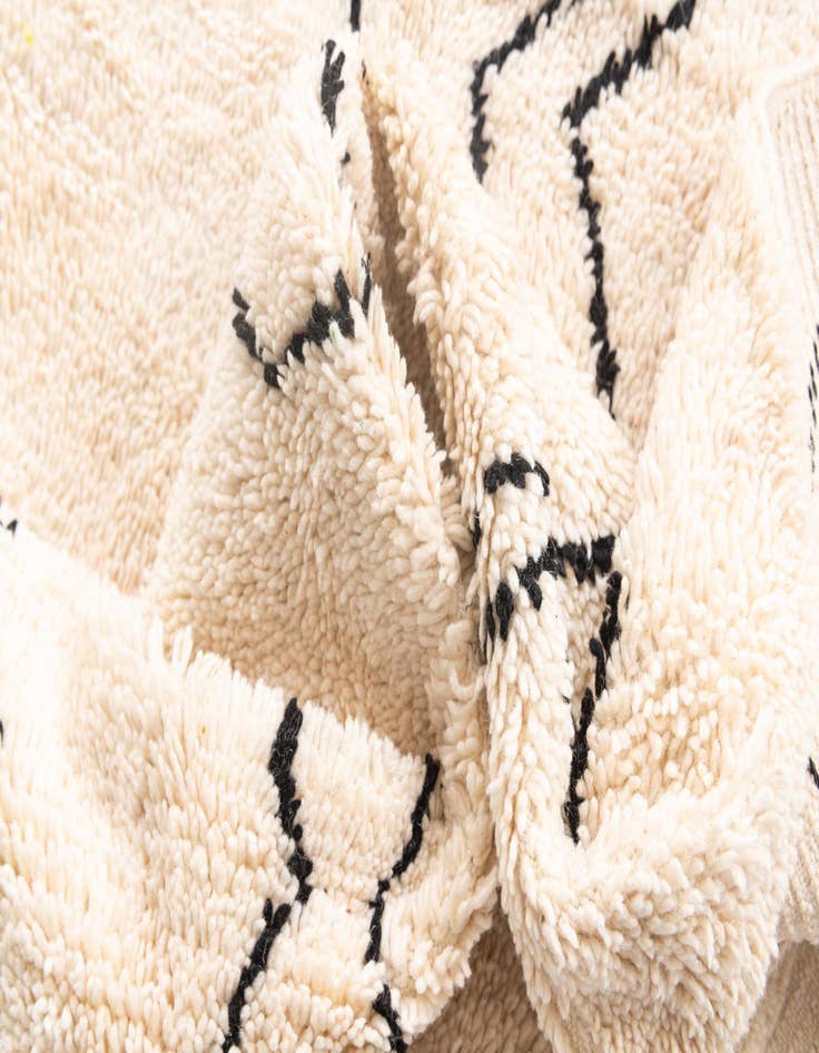 Detail image of  6' 3 x 9' 5  Hand Knotted Moroccan Wool Rug