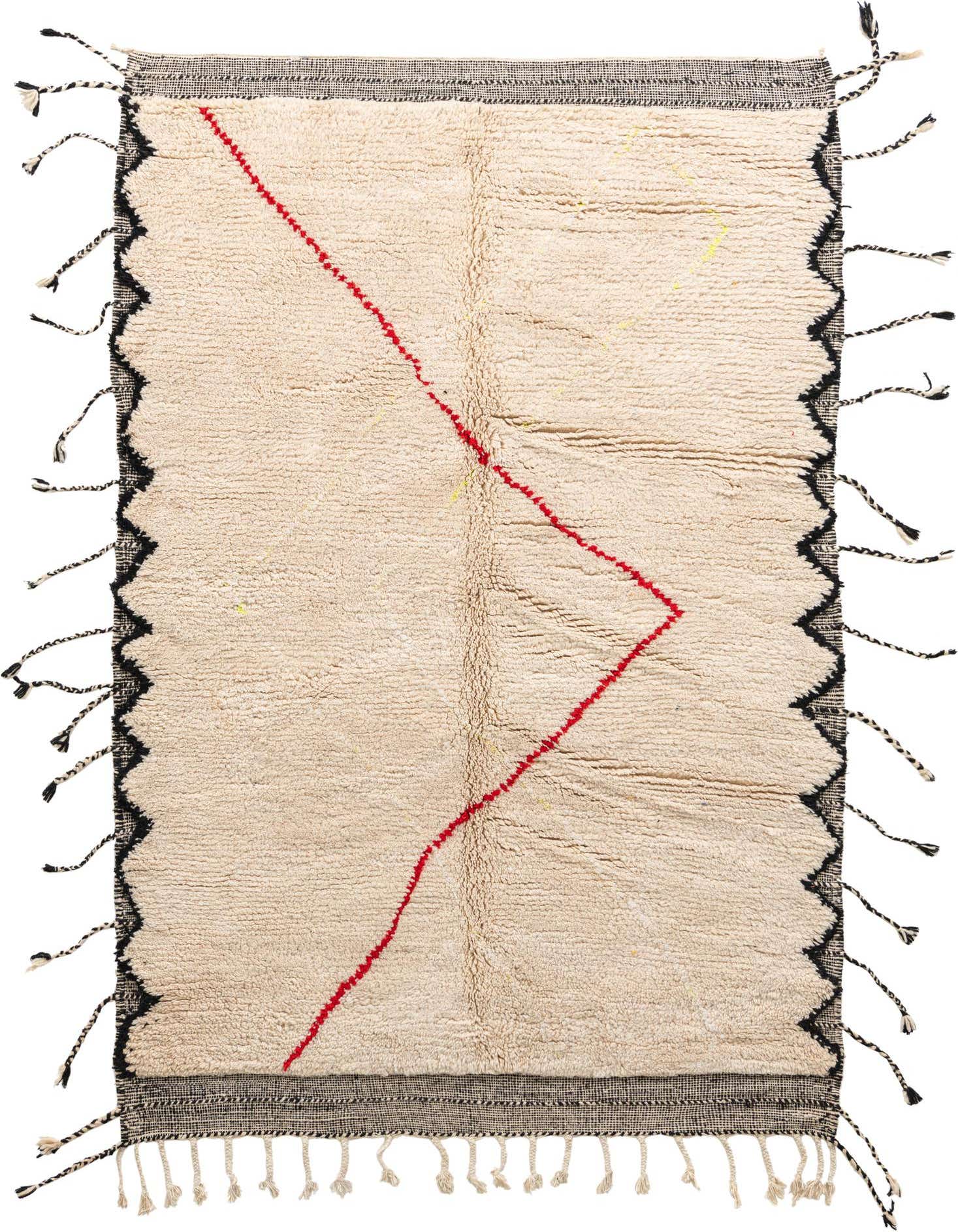 A 5x8 rectangular ivory shag rug with a red abstract zigzag line and black tribal patterns on the sides, featuring braided tassels.