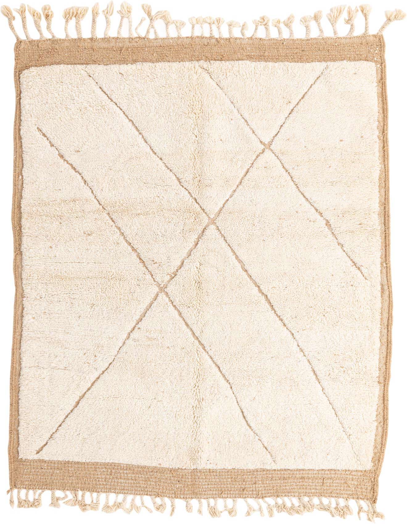 A 6x9 rectangular ivory shag rug with a subtle tribal diamond pattern and fringed ends, ideal for a living room.