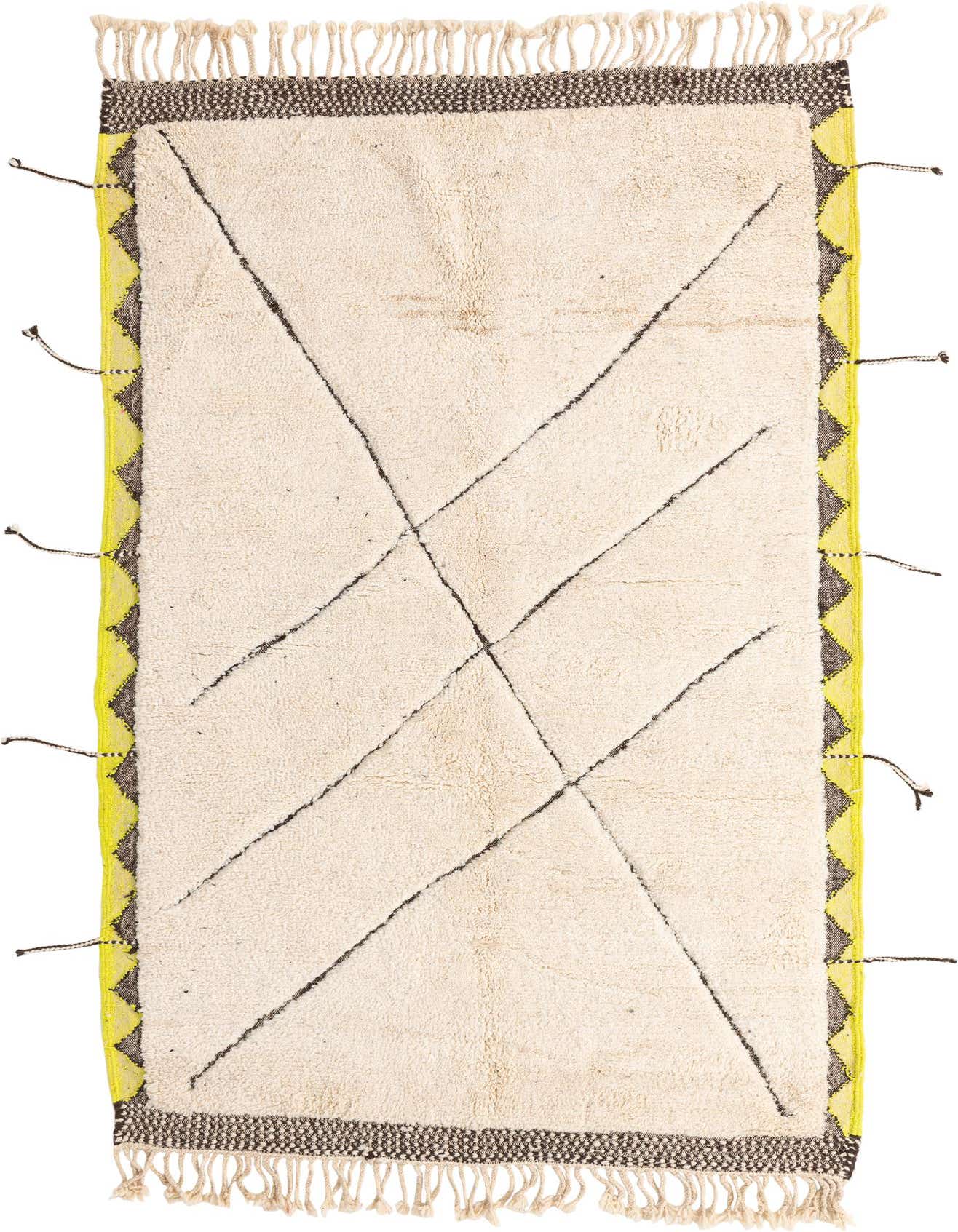 A 5x8 rectangular ivory shag rug with black tribal lines and a bright yellow and black patterned border, featuring tassels.