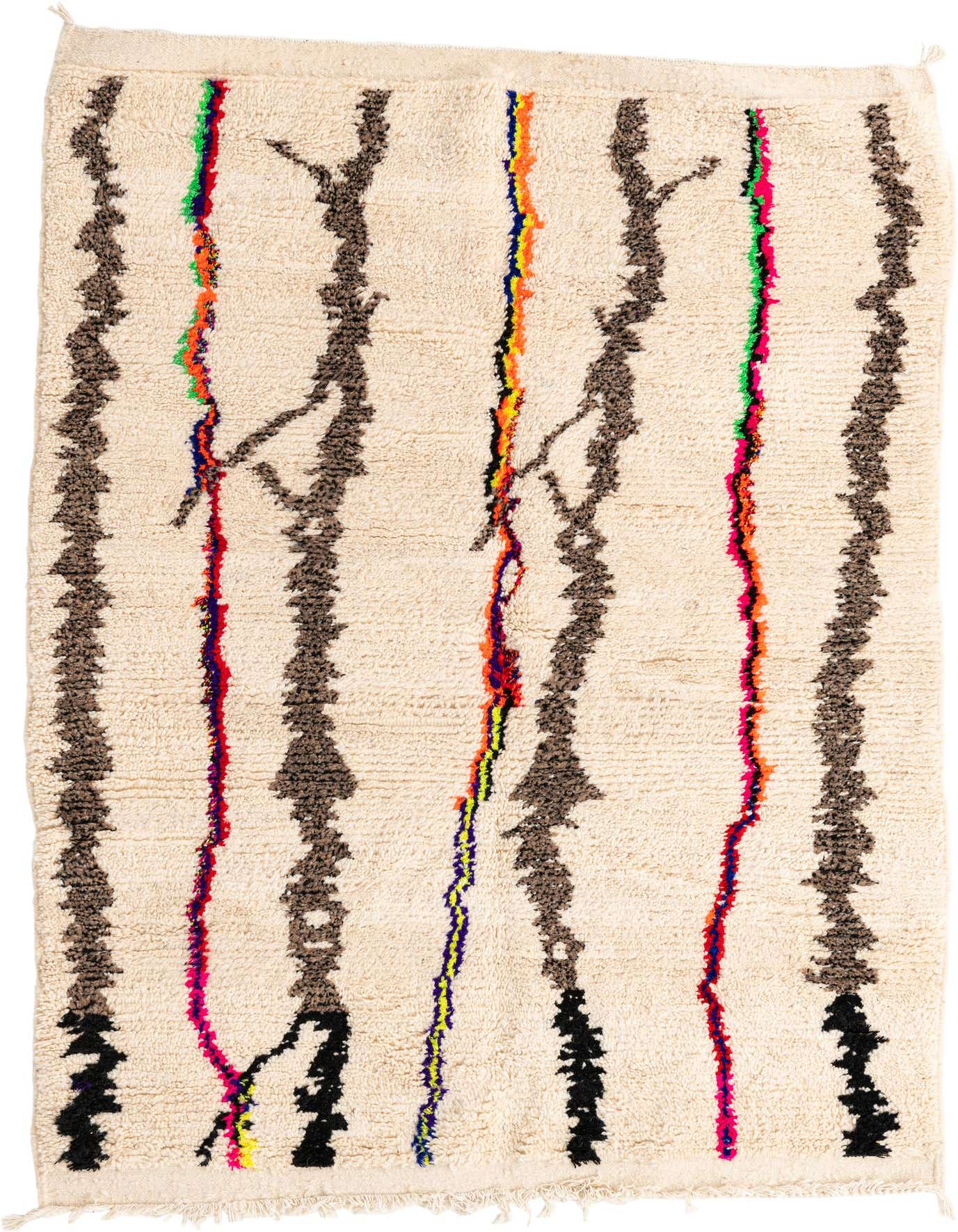A 5x7 rectangular ivory shag rug with abstract tribal patterns in brown, black, and vibrant multicolored lines.