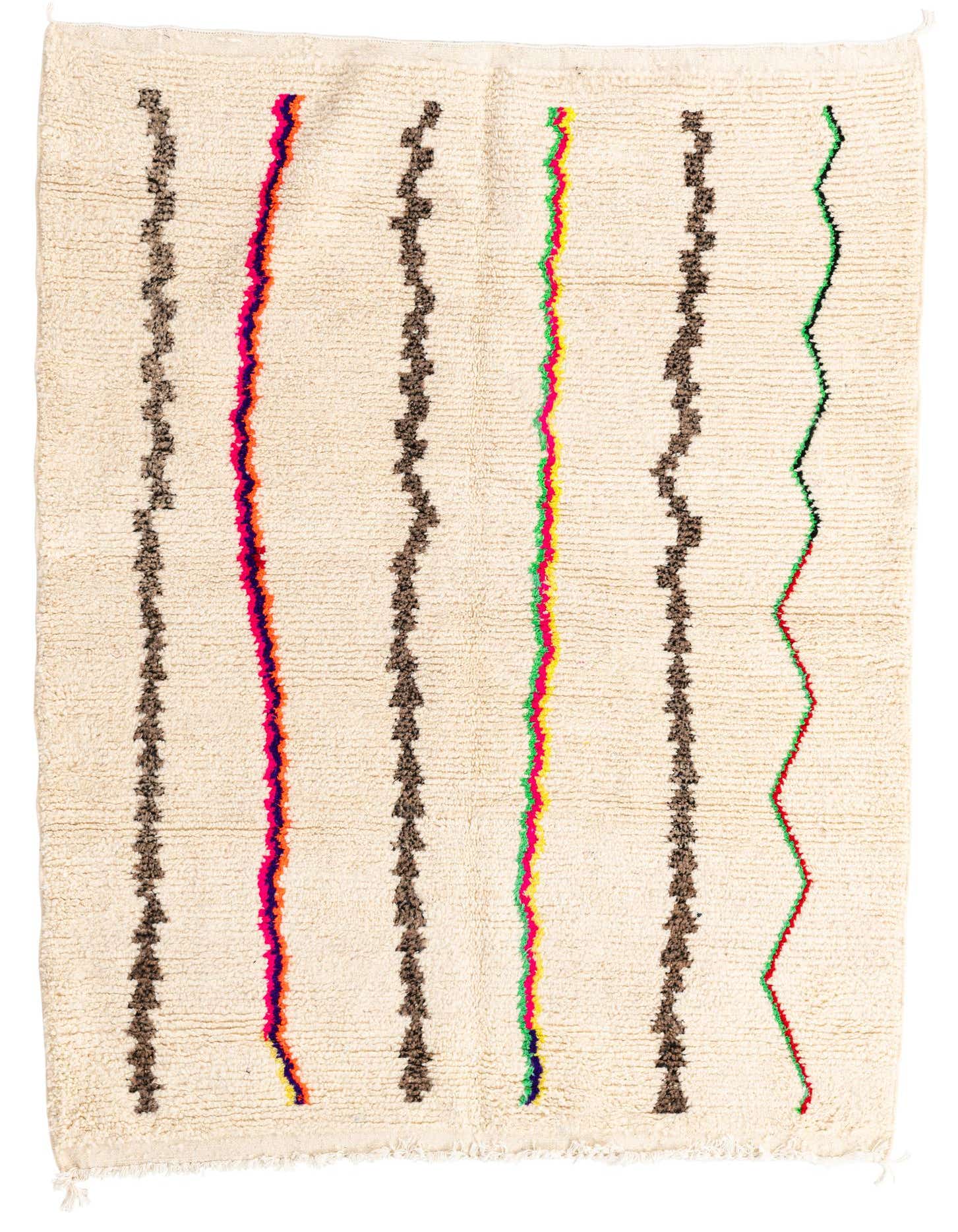 A 5x8 rectangular ivory shag rug with vertical tribal patterns in brown, pink, orange, yellow, green, and red.