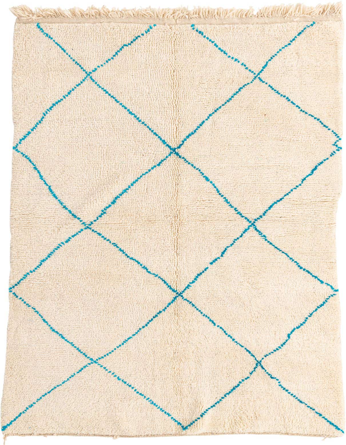 A 5x8 rectangular ivory shag rug with a modern tribal diamond pattern in blue, suitable for a living room.