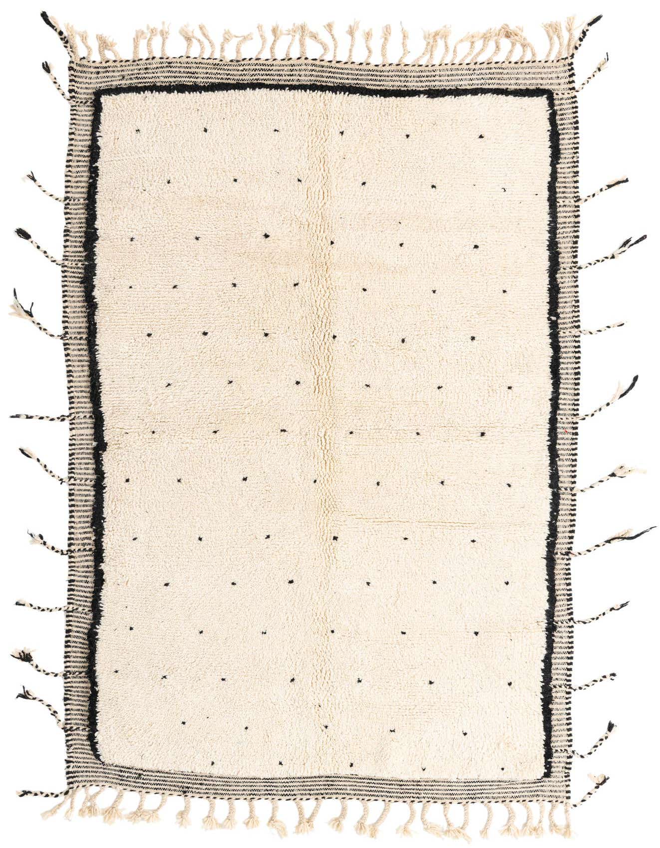 A 5x8 rectangular ivory shag rug with a black striped border and scattered black tribal dots.