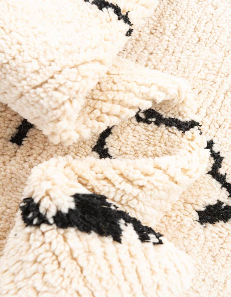 Detail image of  5' x 7'  Hand Knotted Moroccan Wool Rug