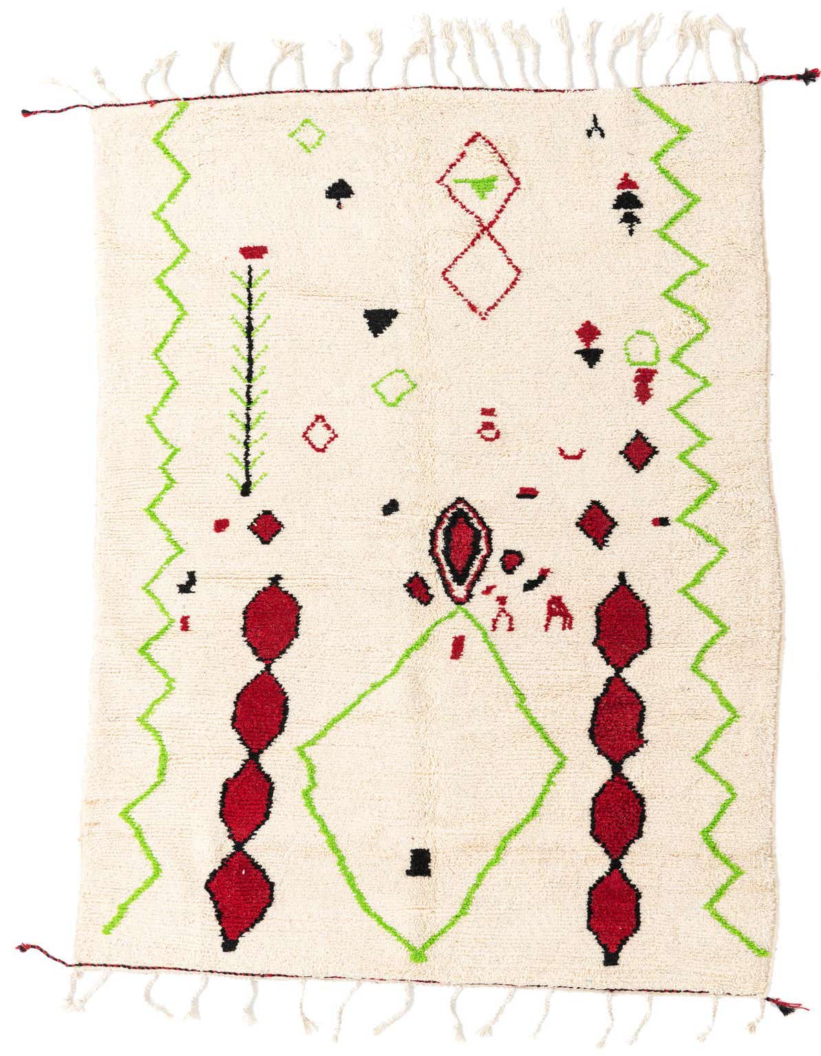 A 5x8 rectangular ivory shag rug with green zigzag borders and abstract red and black tribal patterns.