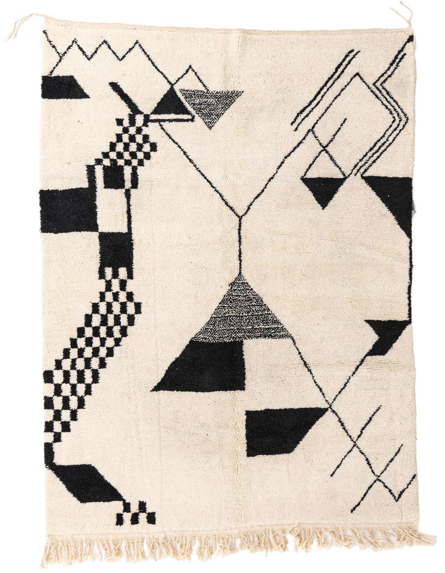 A 7x10 rectangular ivory shag rug with a modern tribal pattern featuring black geometric shapes and lines.