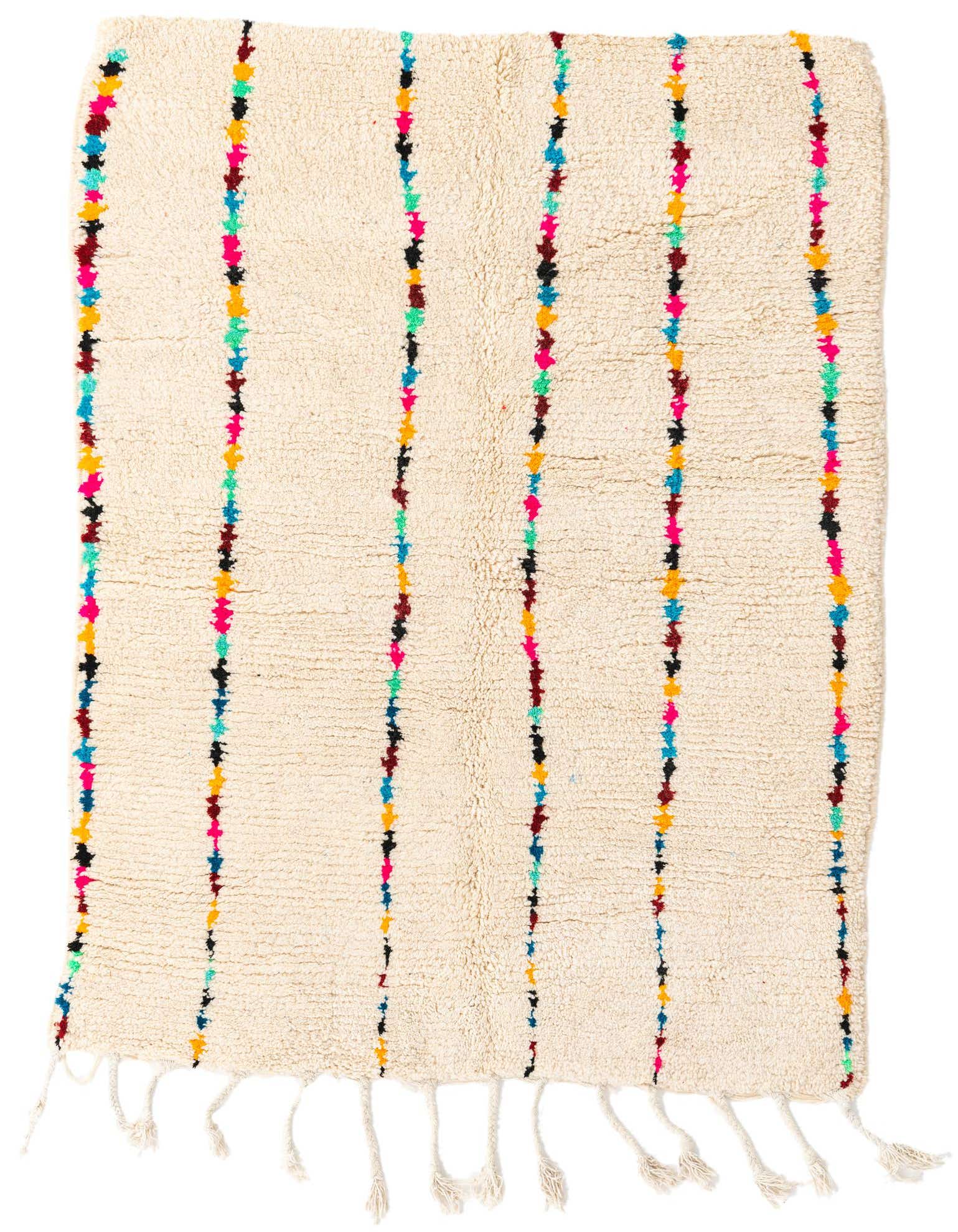 A 4x6 rectangular ivory shag rug with vertical stripes of colorful abstract tribal patterns and tassels.