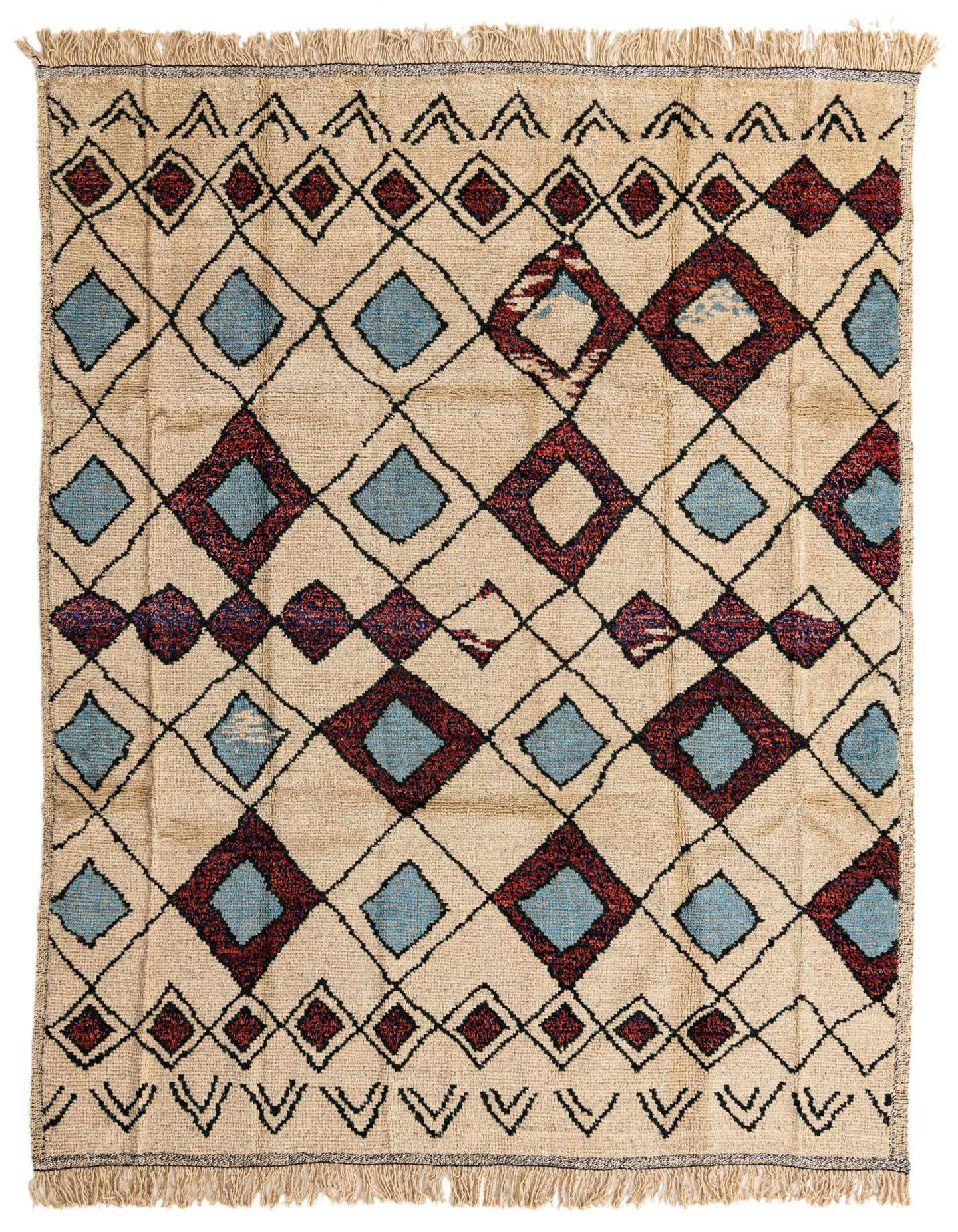 An 8x10 rectangular ivory wool shag rug with a tribal geometric pattern of red and blue diamonds.
