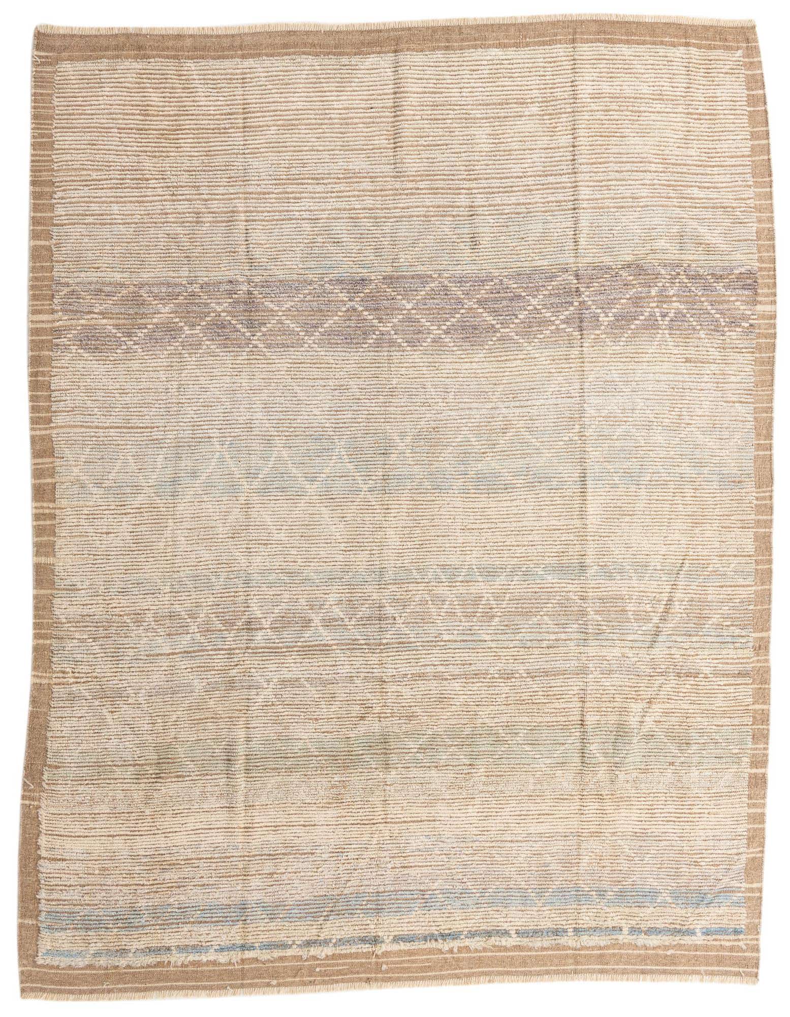 An 8x10 rectangular ivory shag rug with subtle tribal patterns in muted blues and browns, suitable for a living room.