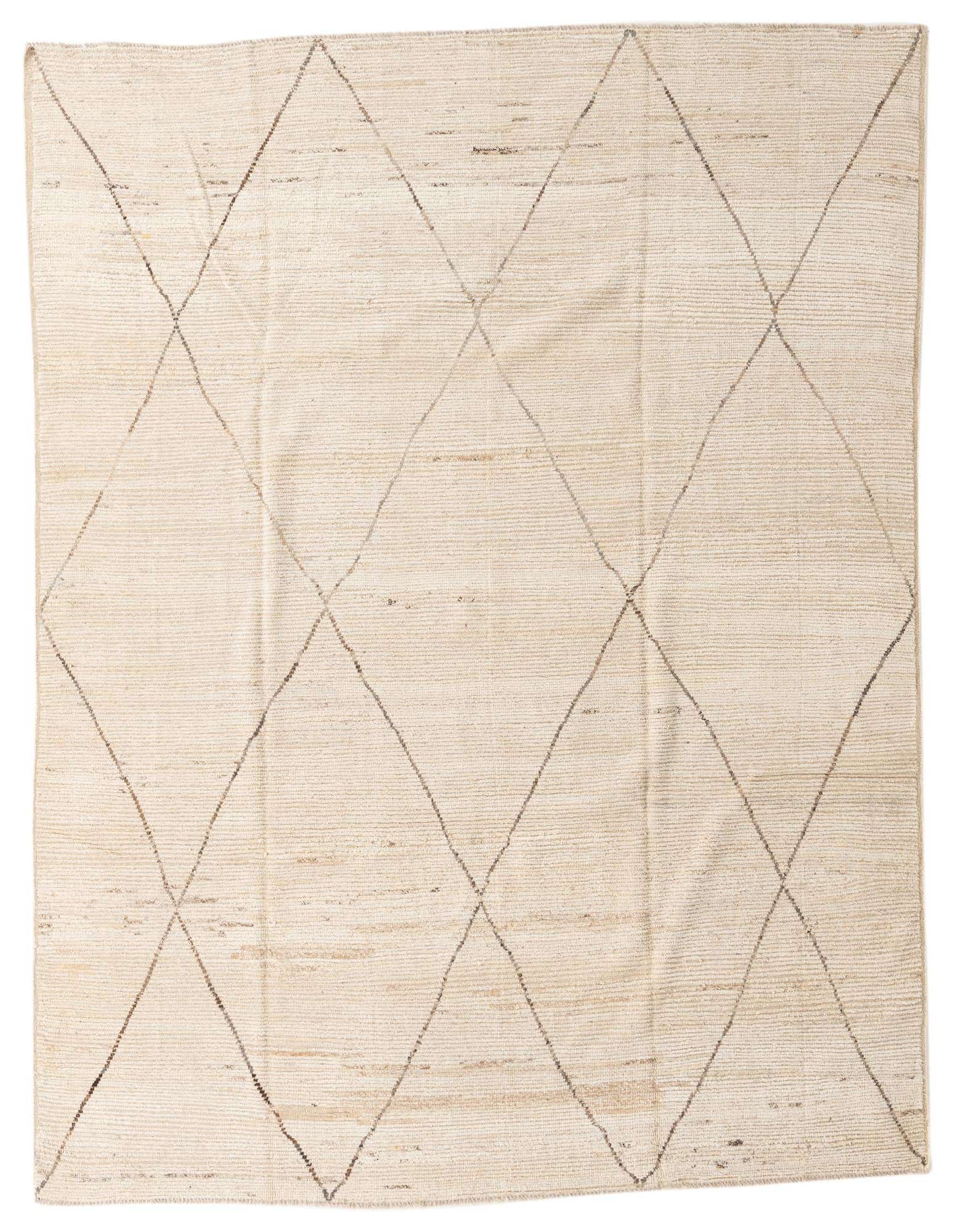 An 8x10 rectangular ivory wool shag rug with a subtle tribal diamond pattern, perfect for a modern living room.