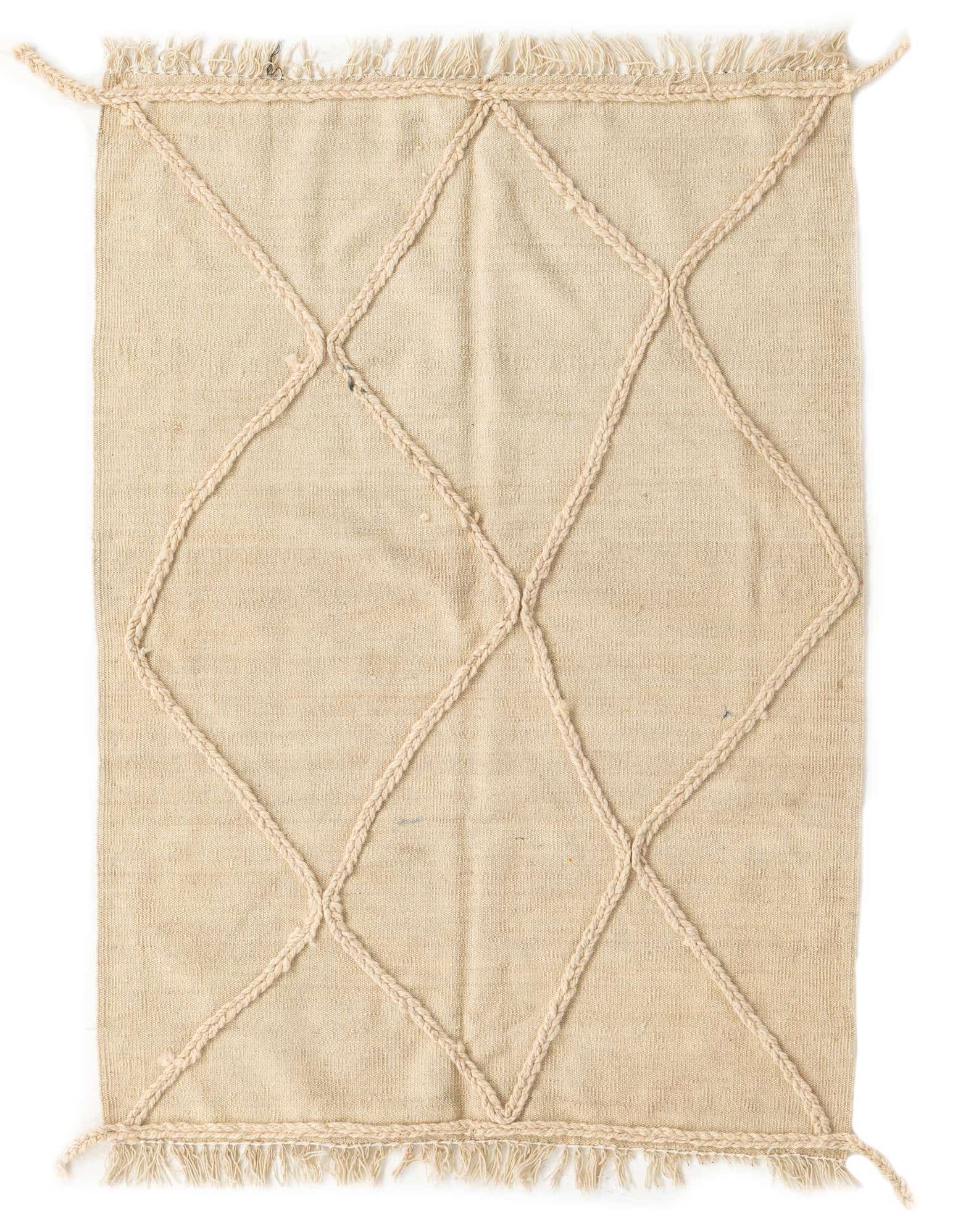 A 3x5 rectangular ivory wool shag rug with a braided diamond pattern and fringed edges.