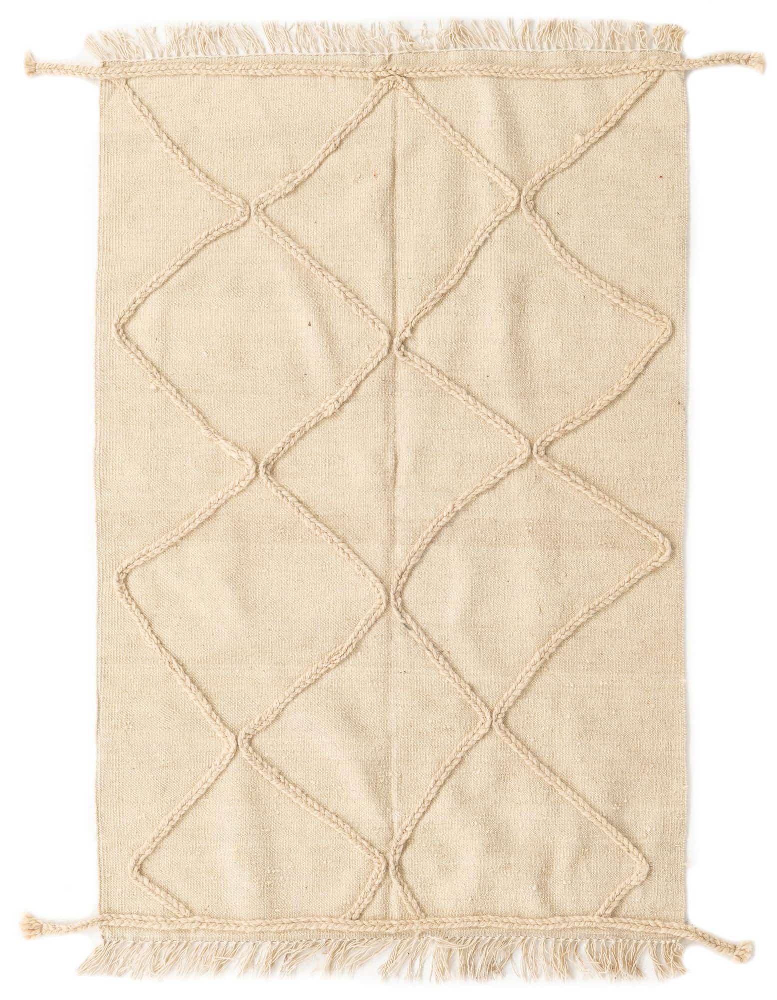 A 3x5 rectangular ivory wool shag rug with a raised braided diamond pattern and fringed ends.
