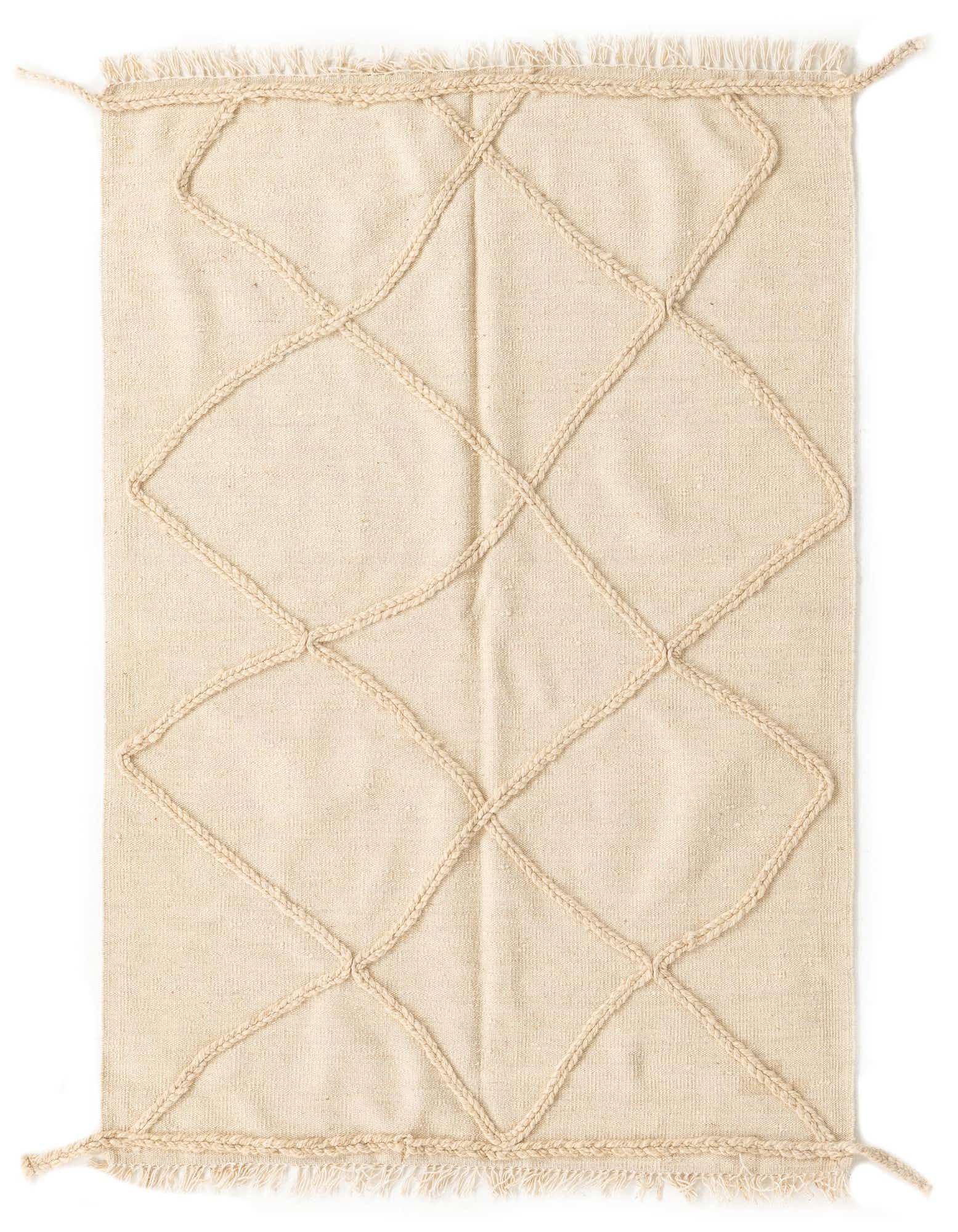 A rectangular 3x5 ivory wool shag rug featuring a raised braided diamond pattern and fringed edges.