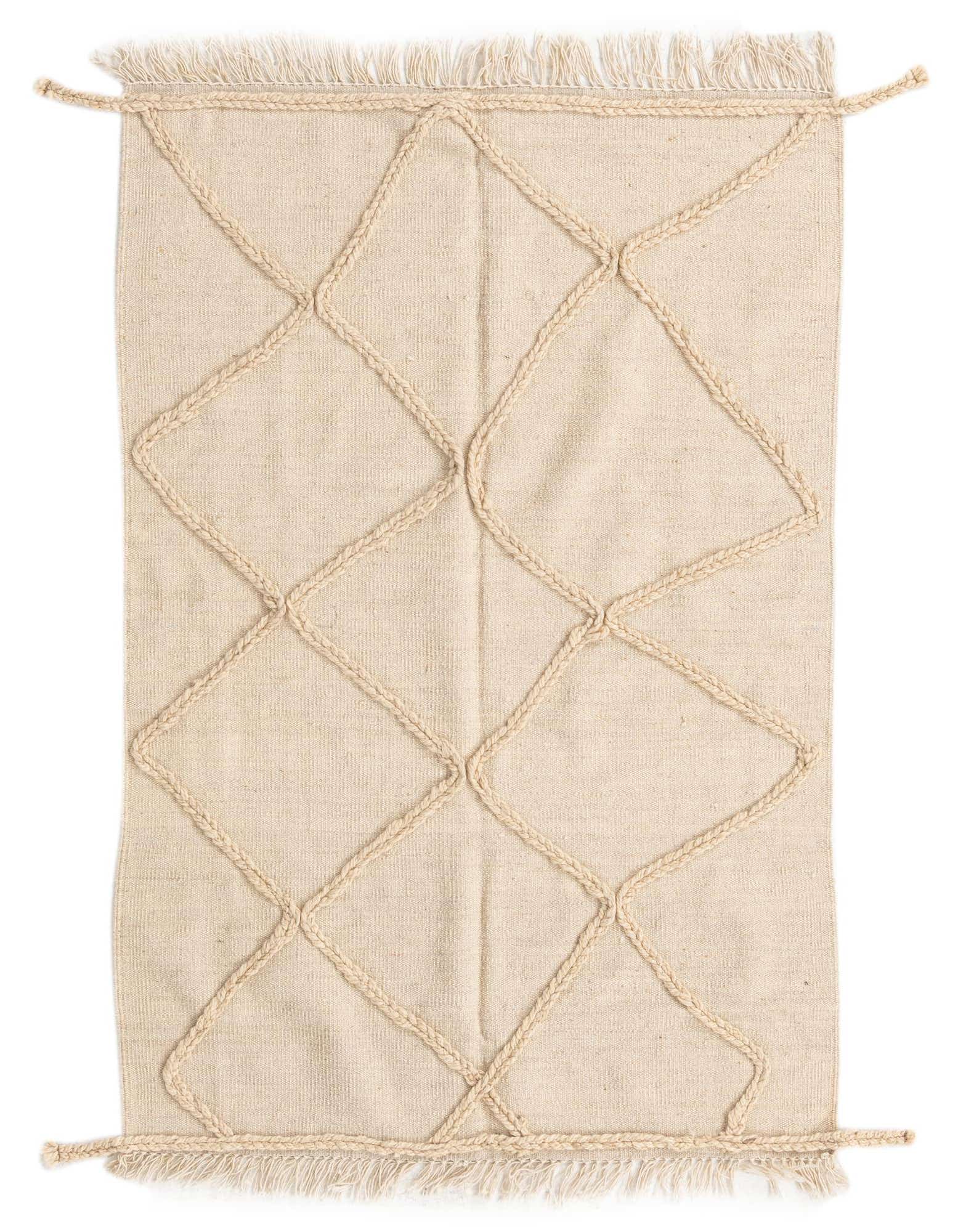 A 3x5 rectangular ivory wool shag rug featuring a raised braided diamond pattern and fringe tassels.
