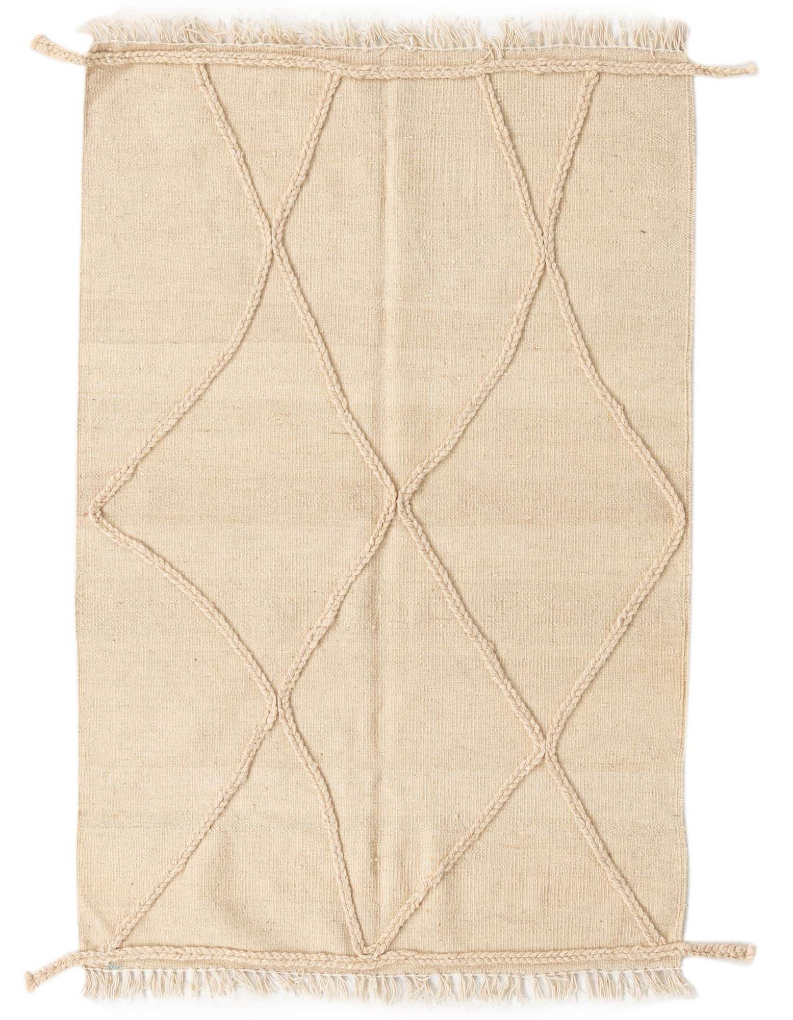 A 3x5 rectangular ivory wool shag rug with a raised braided diamond pattern and fringe.