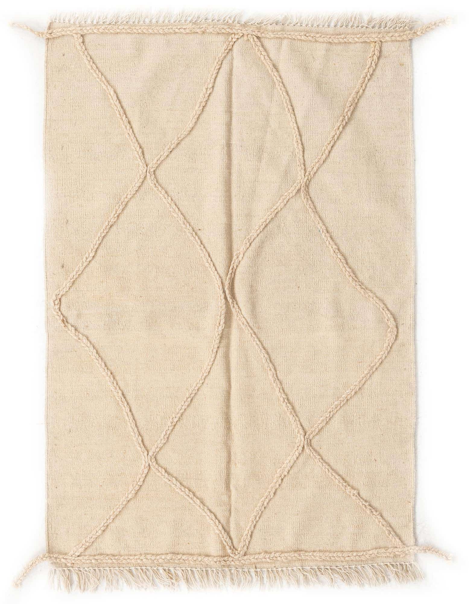 A 3x5 rectangular ivory wool shag rug with a raised braided diamond pattern and fringed ends.