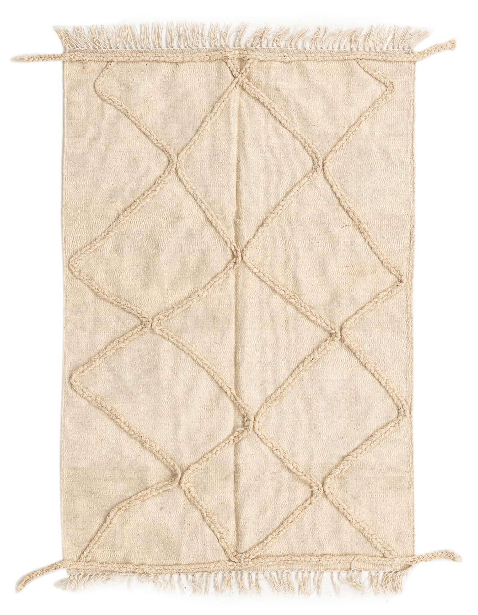 A 3x5 rectangular ivory wool shag rug with a raised braided diamond pattern and fringe.