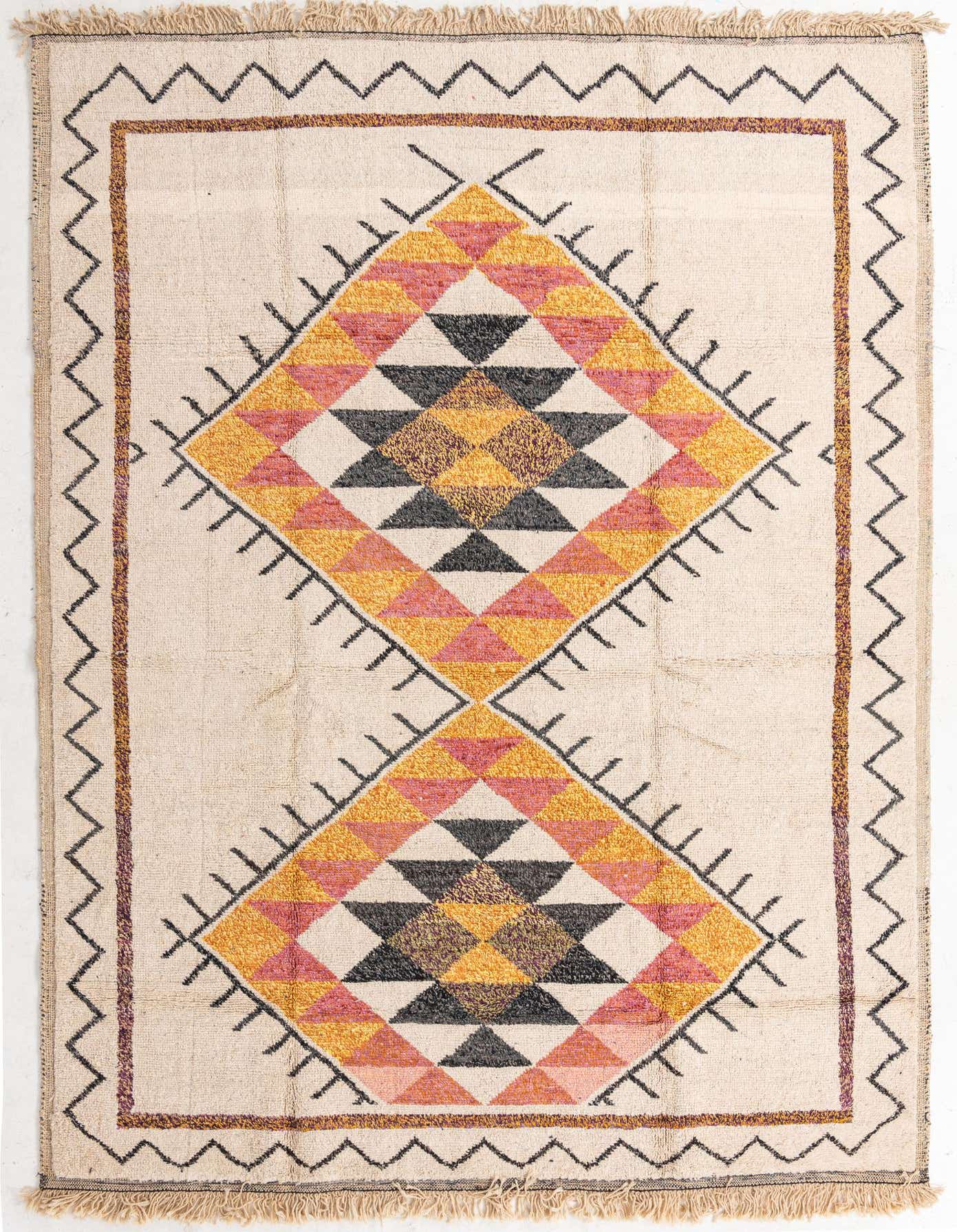 A 9x12 rectangular ivory wool shag rug with a modern tribal pattern featuring large orange, pink, and black geometric diamonds.