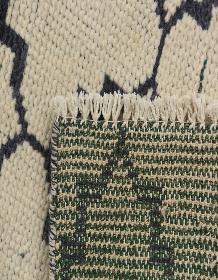 Detail image of  4' 7 x 8' 3  Hand Knotted Moroccan Wool Rug