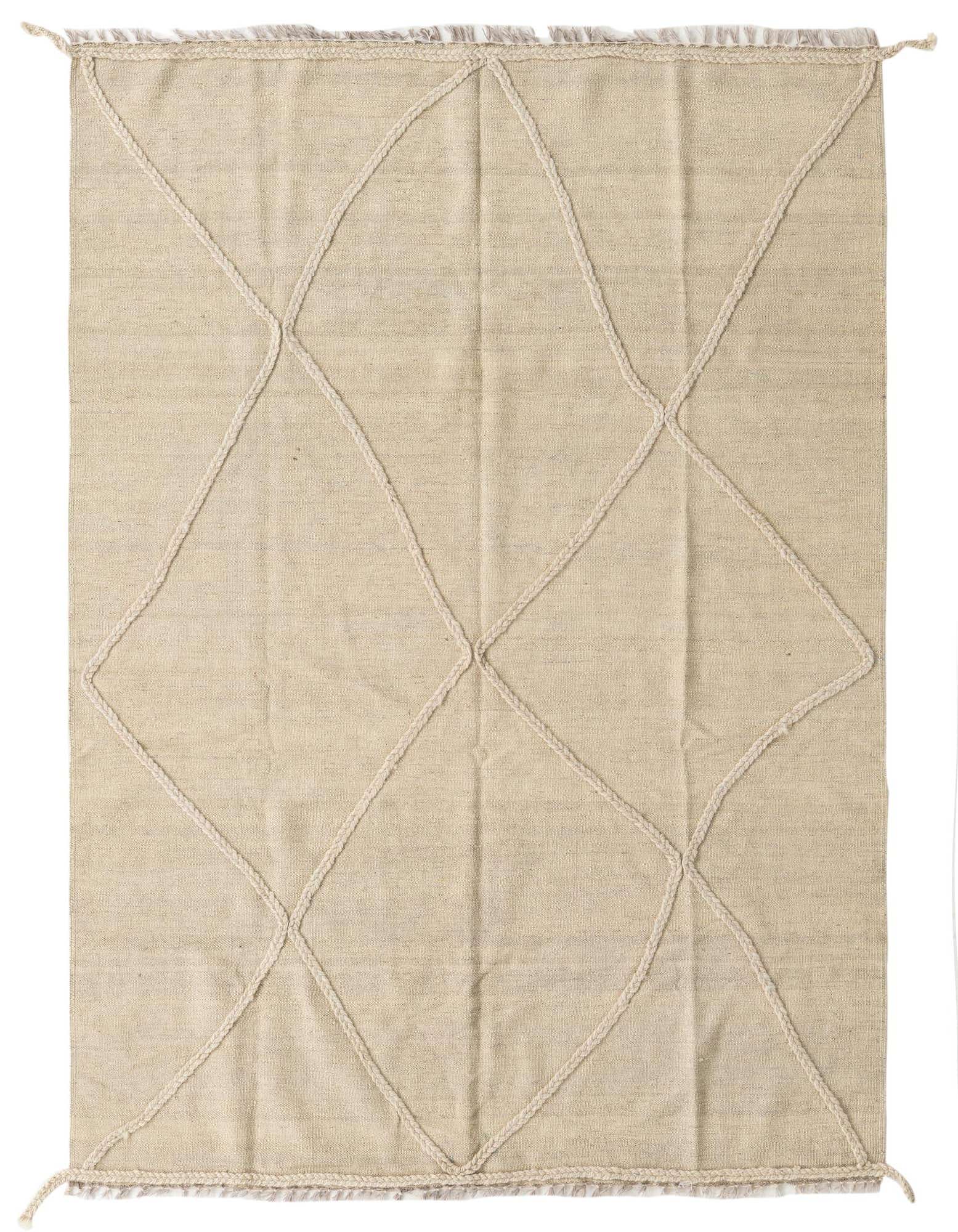 A 4x6 rectangular ivory wool shag rug with a braided diamond pattern and fringed edges.