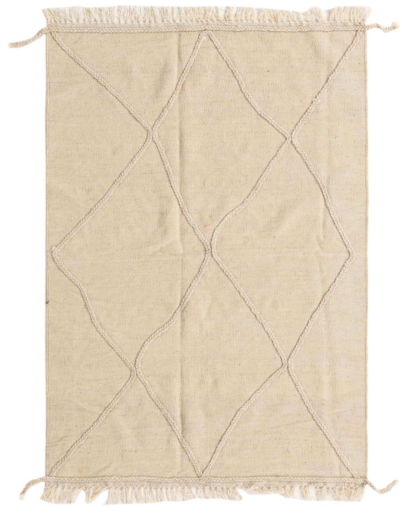 A 3x5 rectangular ivory wool shag rug with a raised braided tribal diamond pattern and fringed edges.