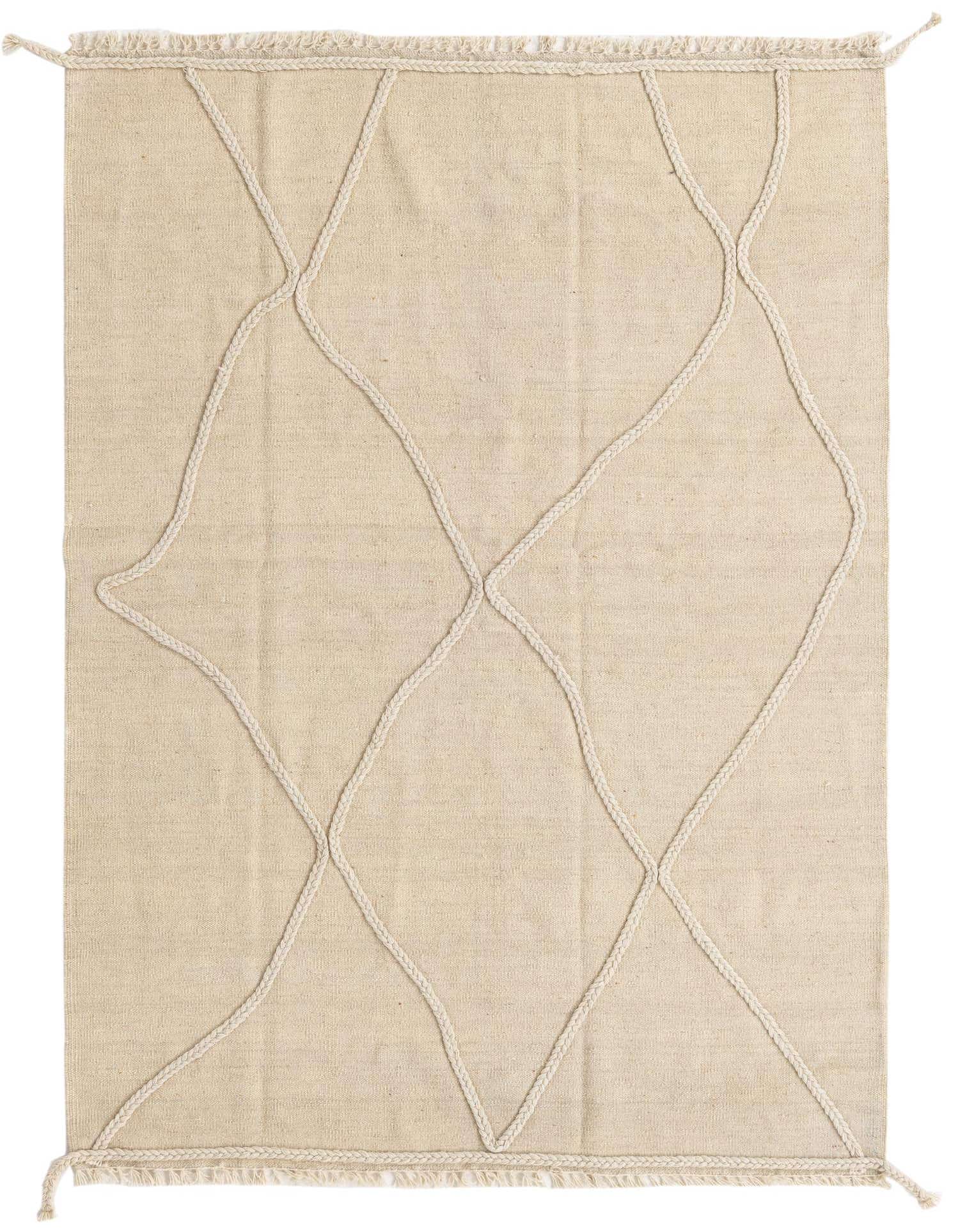 A 4x6 rectangular ivory wool shag rug with a modern tribal diamond pattern formed by raised braided textures.