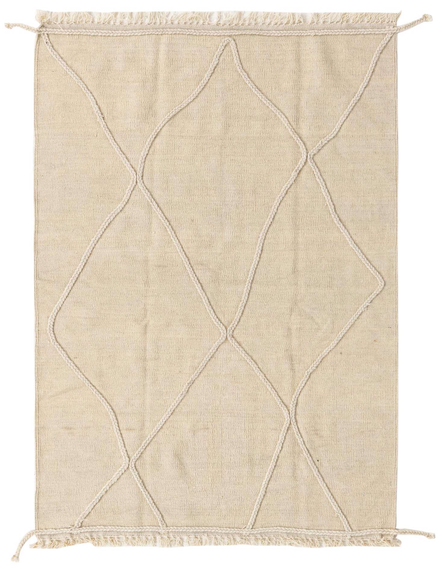 A 3x5 rectangular ivory wool shag rug featuring a modern tribal diamond pattern created with braided texture.