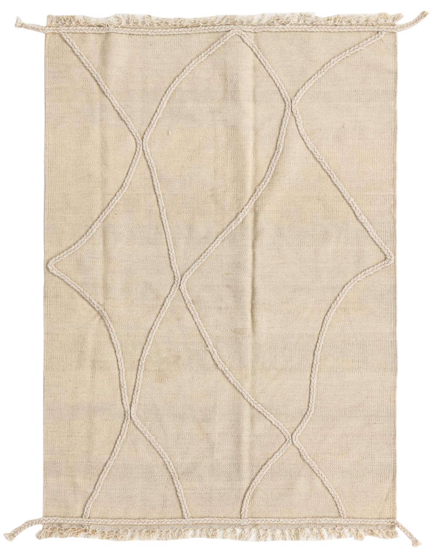 A 3x5 rectangular ivory wool shag rug with a modern tribal braided diamond pattern and fringed edges.