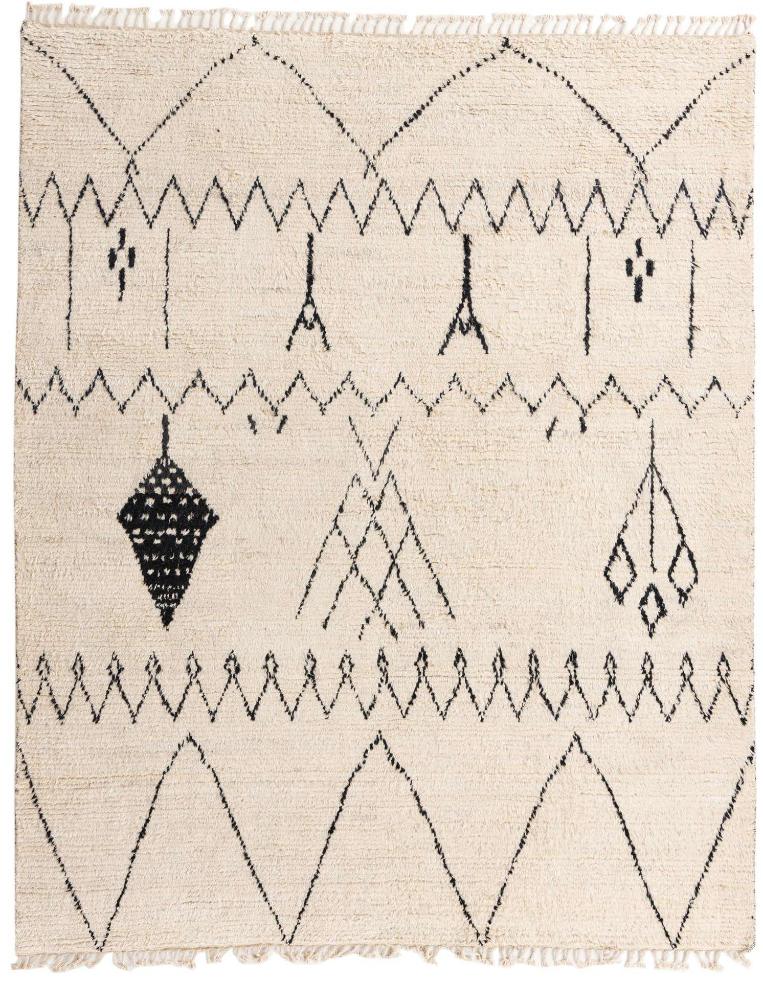 An 8x10 rectangular ivory shag rug with a black tribal, abstract pattern, featuring zigzags, diamonds, and stick figures.