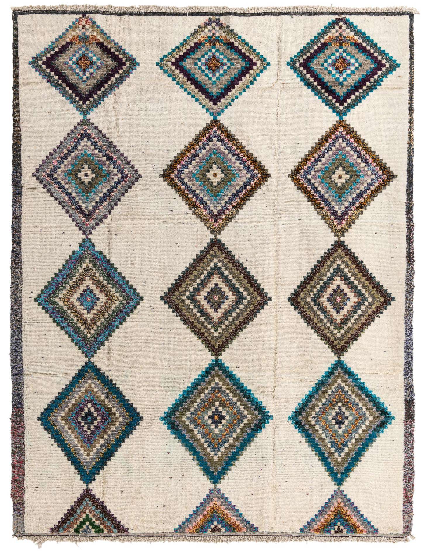 A 9x12 rectangular ivory shag rug with a tribal pattern of colorful diamond motifs in blues, purples, and browns.