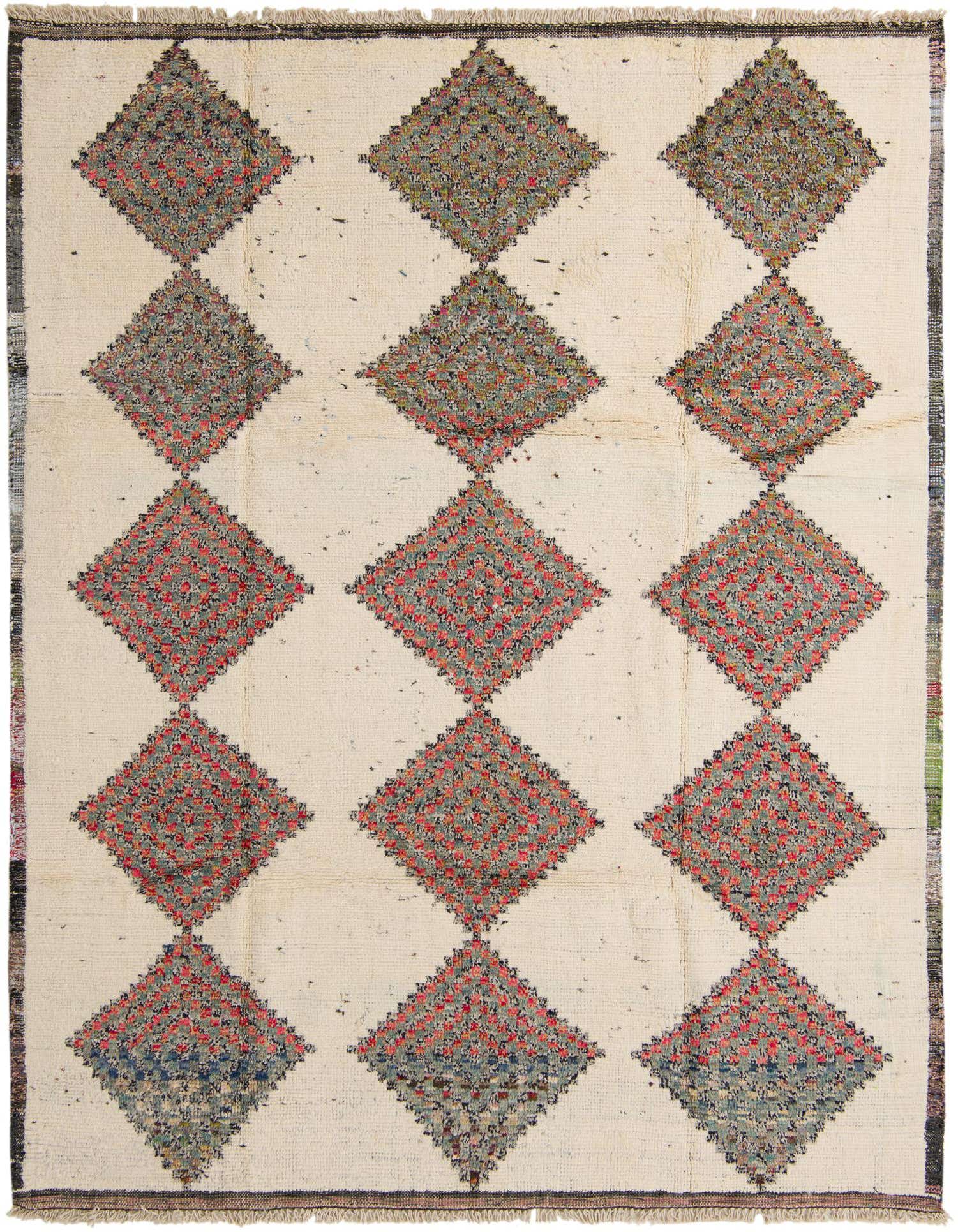 An 8x10 rectangular ivory shag rug with a tribal pattern of large, colorful diamond motifs in red, blue, and green.