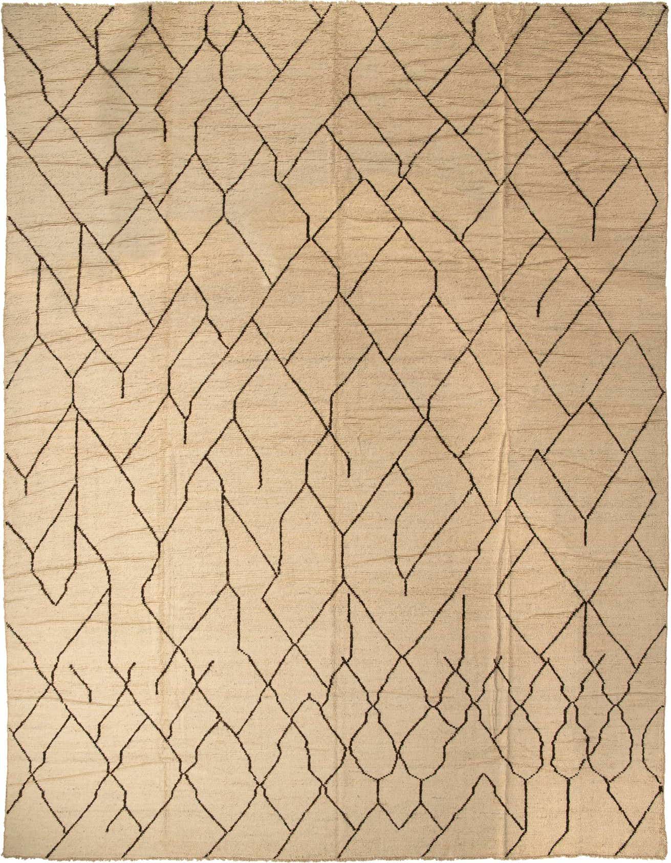 Rectangular ivory shag rug with a modern tribal abstract pattern of thin black lines forming irregular diamond shapes.
