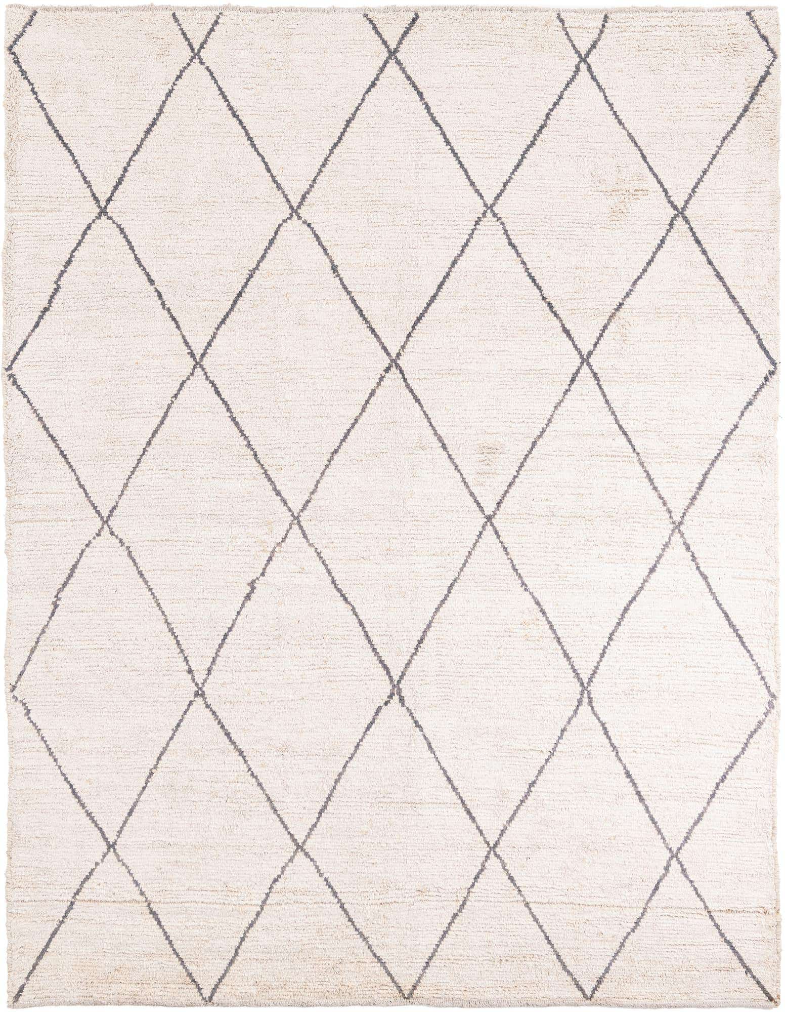 A 6x9 rectangular ivory shag rug with a modern tribal diamond pattern in gray, suitable for a living room.
