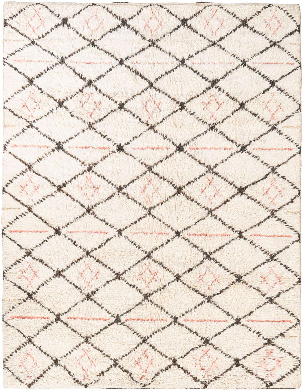 A 6x9 rectangular ivory shag rug with a black diamond trellis pattern and subtle pink tribal accents.