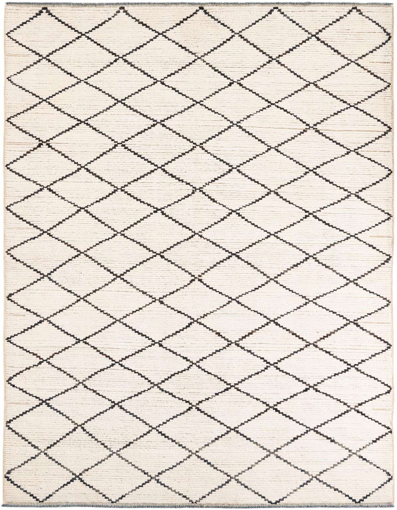 A 6x9 rectangular ivory shag rug with a modern tribal diamond pattern in black, suitable for a living room.