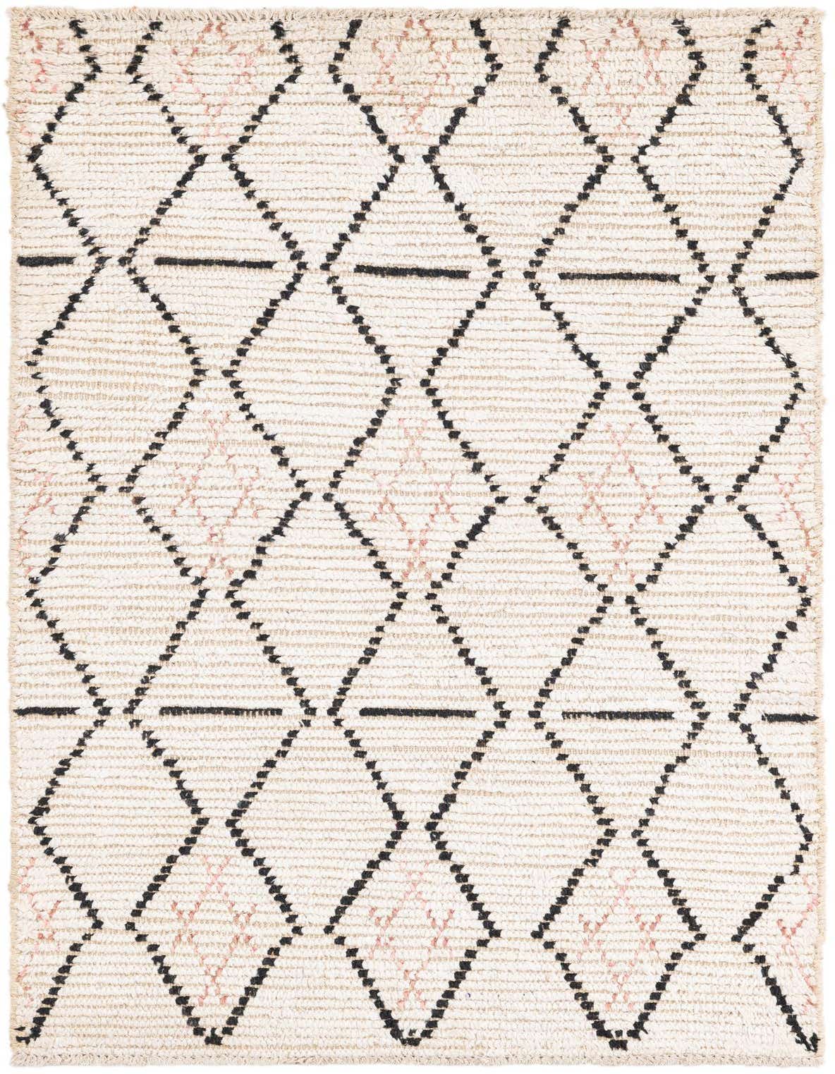 A 3x5 rectangular ivory wool shag rug featuring a modern tribal pattern of black and subtle pink diamond shapes.
