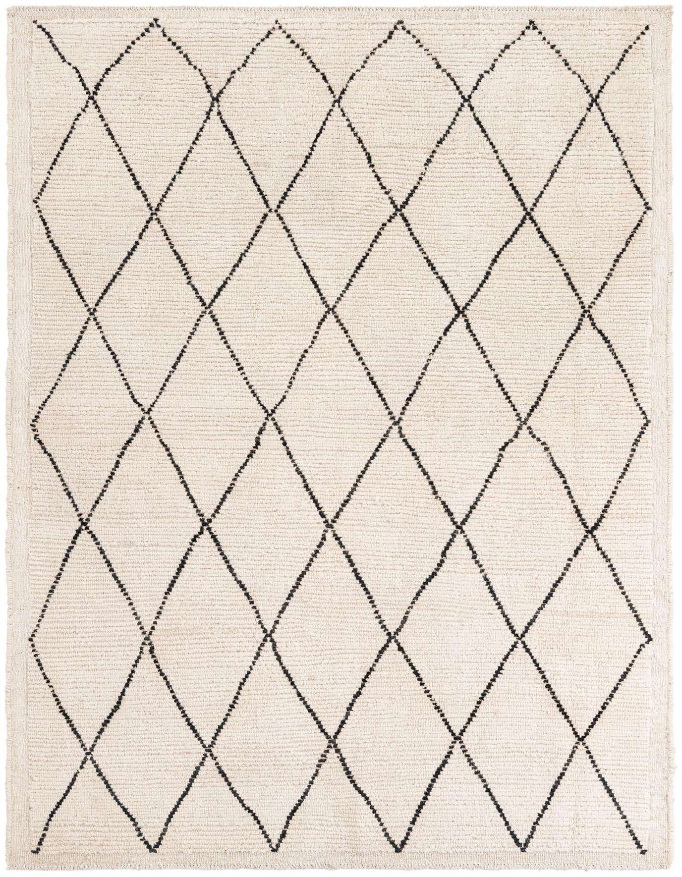 A 5x8 rectangular ivory shag rug with a black tribal diamond pattern, ideal for a living room or bedroom.
