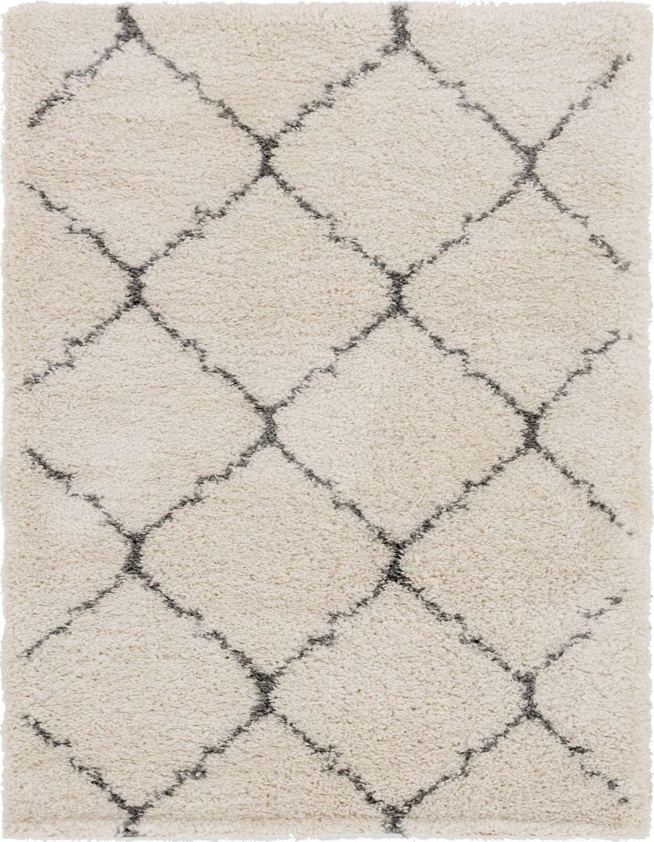 A 4x6 rectangular ivory shag rug with a modern charcoal gray trellis pattern, ideal for a living room or bedroom.