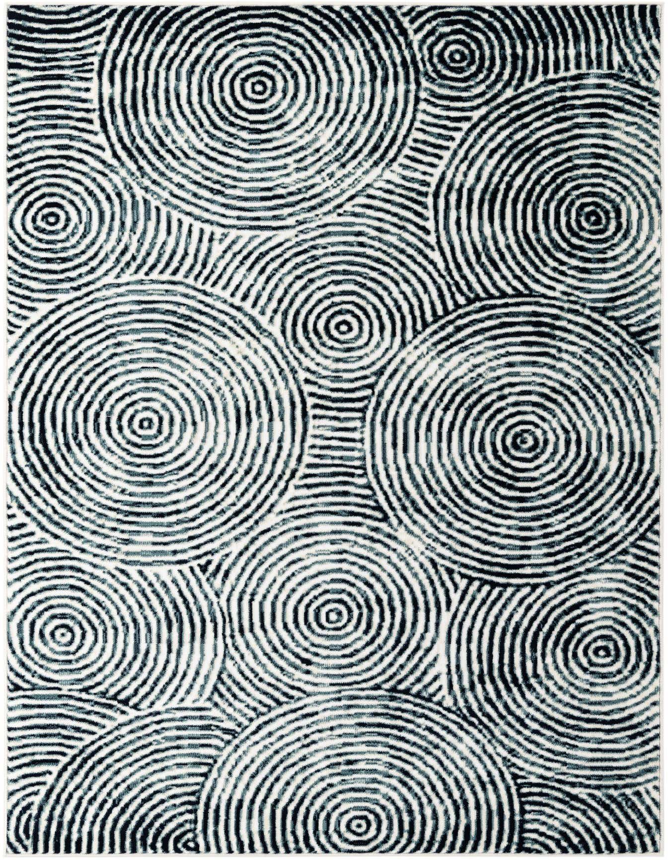 A 5x8 rectangular ivory and black modern abstract rug with a pattern of varying concentric circles.