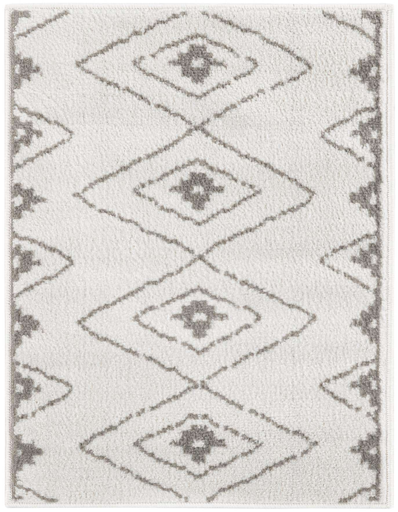 A 2x3 rectangular ivory and cream modern rug with a subtle gray diamond pattern, suitable for an entryway.