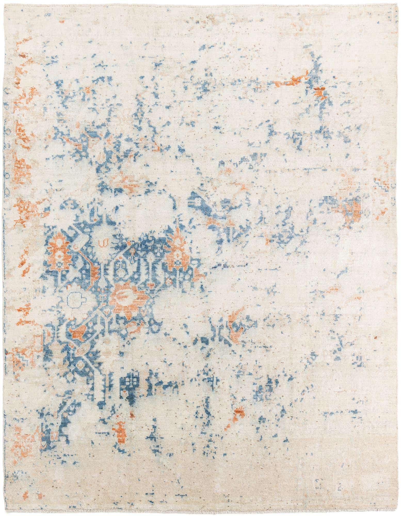 A 9x12 rectangular ivory wool rug with a distressed modern pattern in shades of blue and subtle orange.