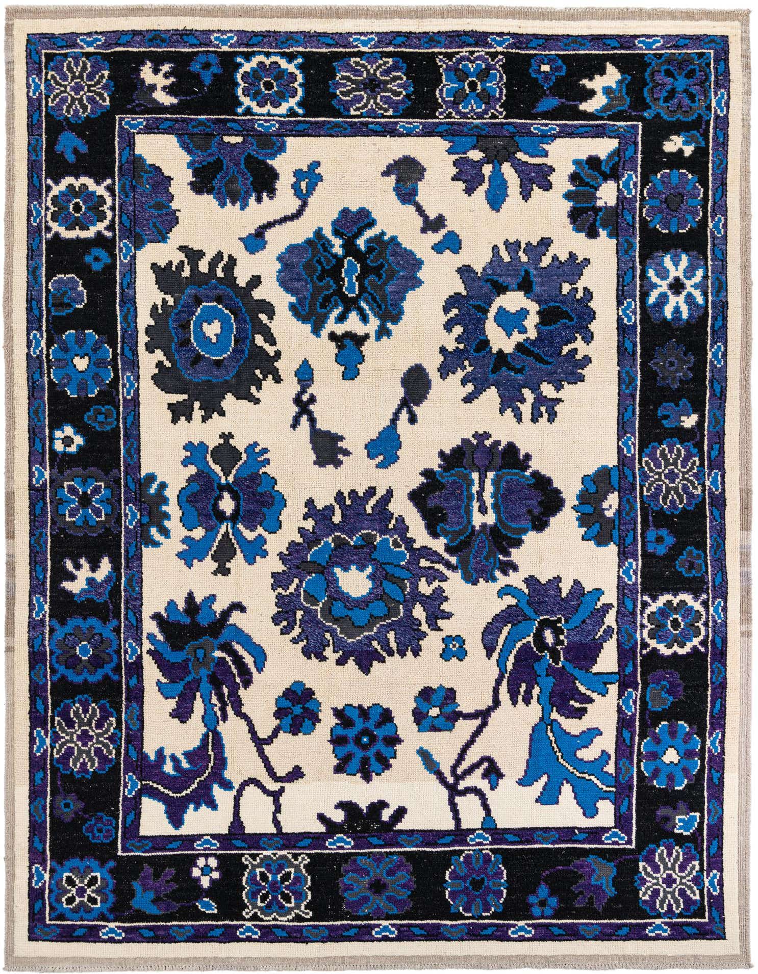 A 9x12 rectangular ivory wool rug with a modern floral pattern in shades of blue and black, featuring a dark border.