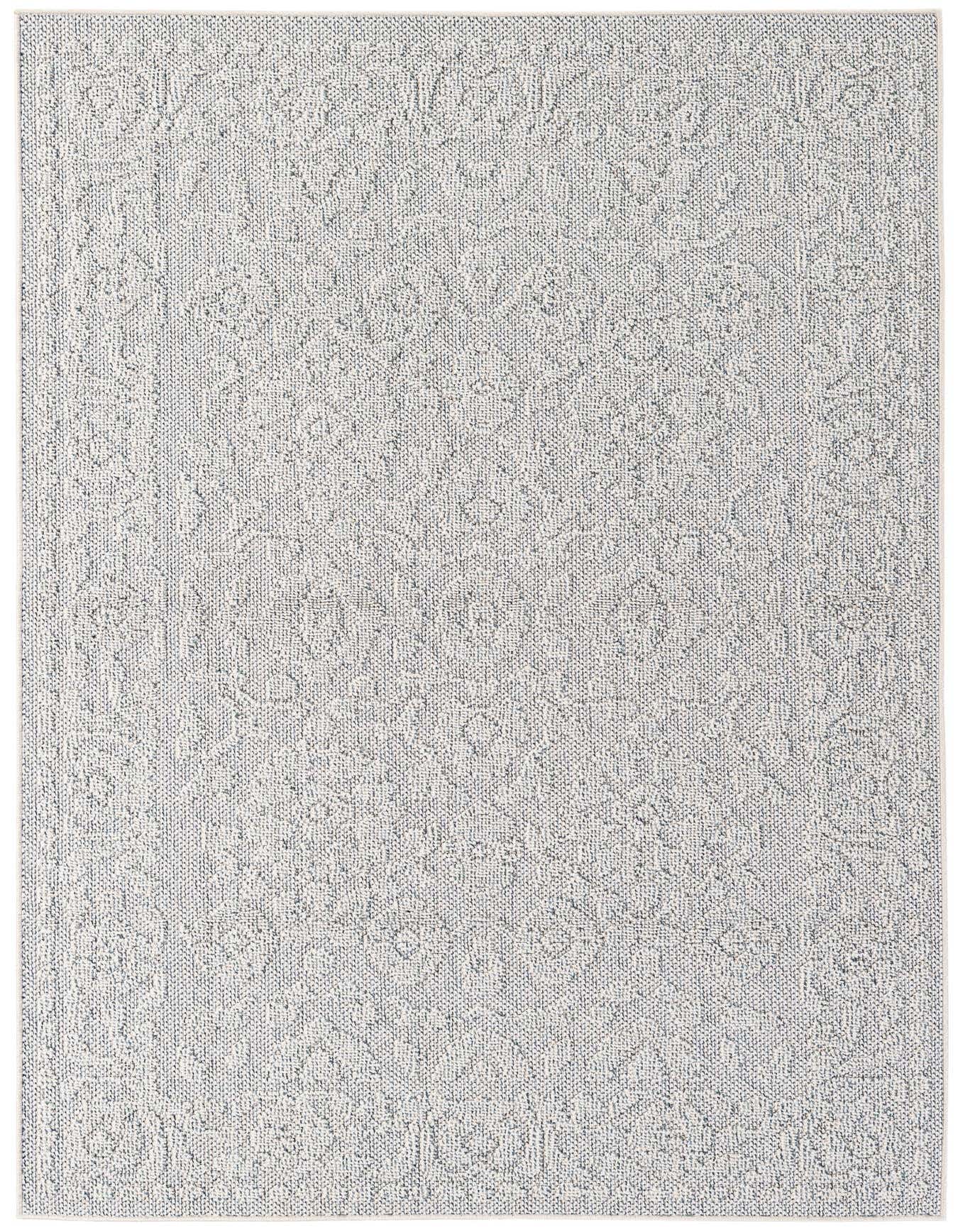 A 5x8 rectangular ivory and cream modern flatweave rug, suitable for indoor or outdoor use.